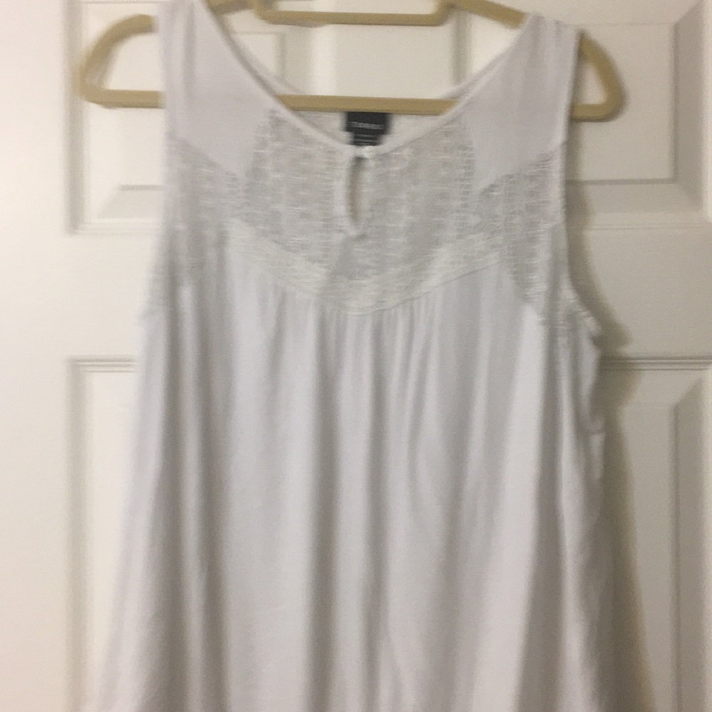 White sleeveless top